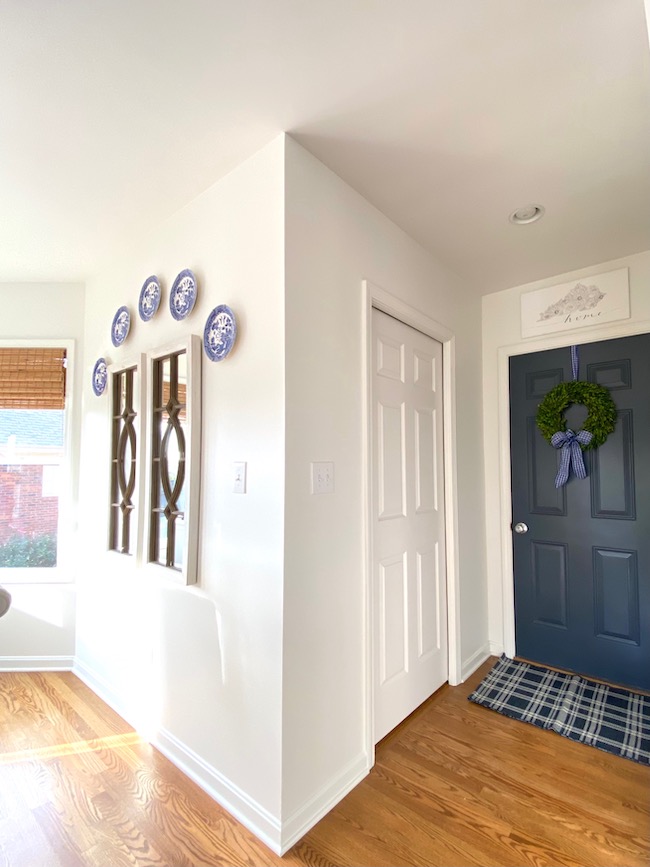 White Kitchen Walls with Navy Door