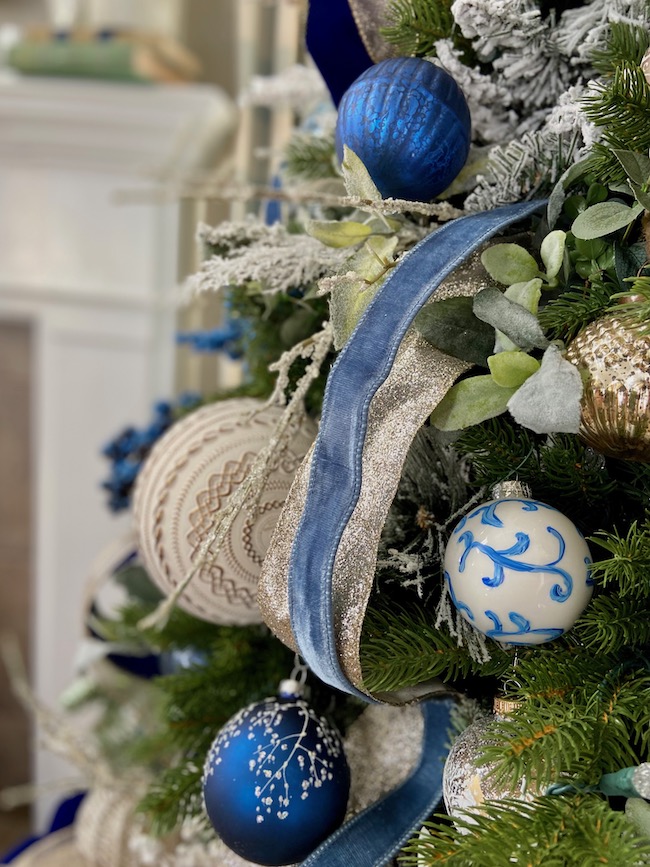 New year theme: Christmas tree white and silver decorations, blue