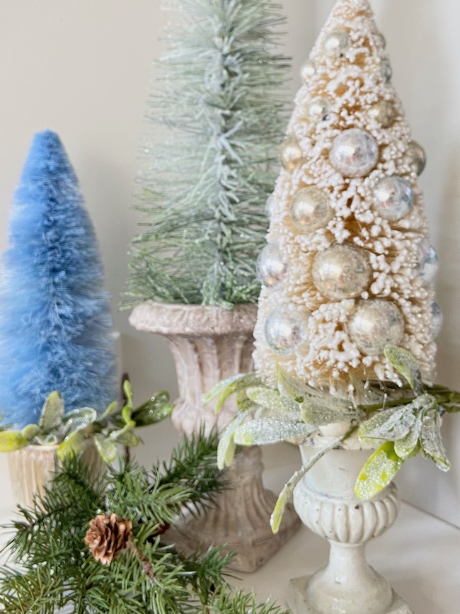 https://perfectingplaces.com/wp-content/uploads/2021/11/Decorate_with_bottle_brush_trees_bottle_brush_topiaries.jpeg