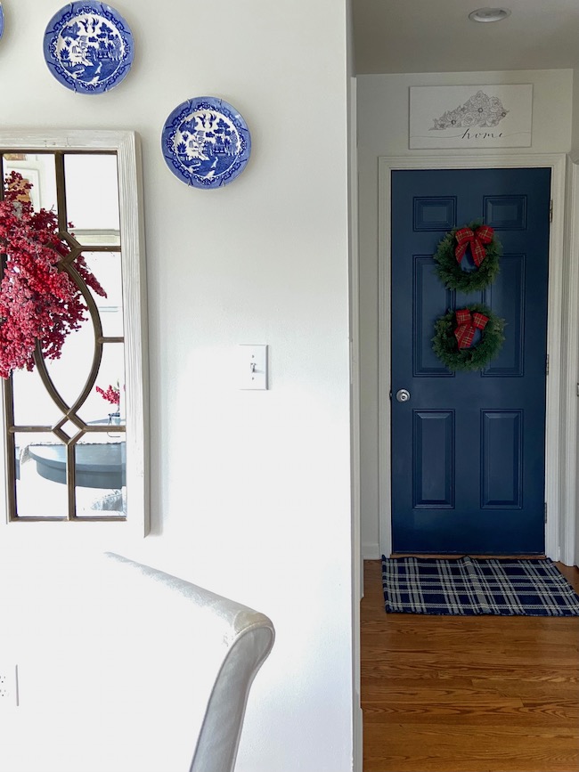 Two Small Wreaths on Navy Door