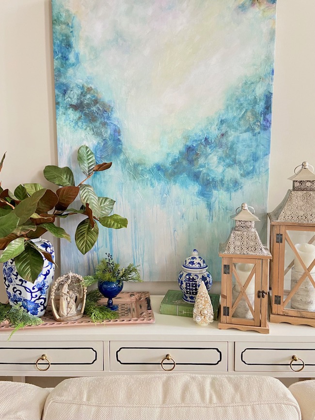 Blue and White Christmas Decor on Sofa Table