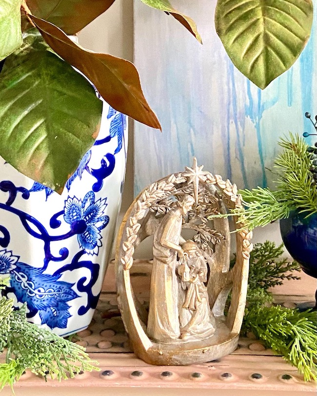Nativity Scene with Blue and White Vase and Greenery