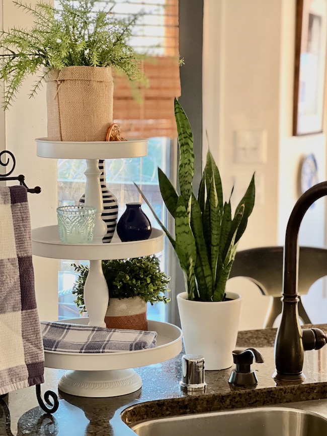 Three-tiered Tray beside Sink