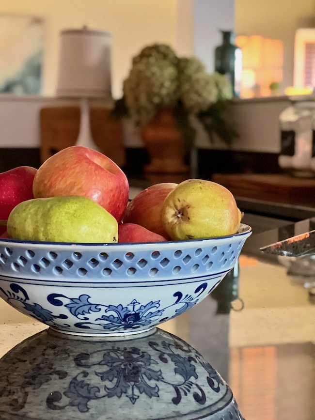 Blue and White Bowl with Fruit on Counter