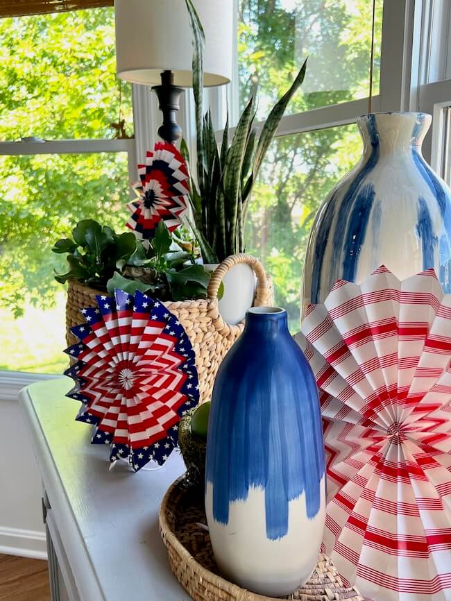 Easy July 4th decorations using red, white, and blue paper fans