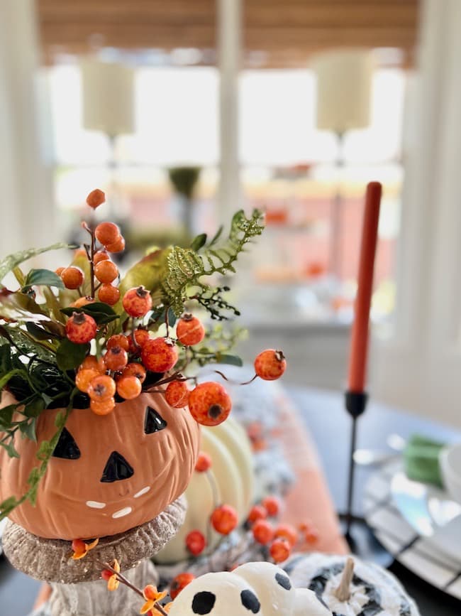 Jack-o-lantern centerpiece on Halloween table