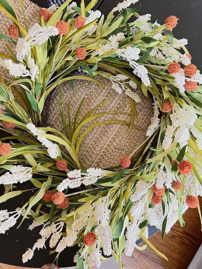 Transition a Summer Wreath into Fall by Adding Orange Fall Stems