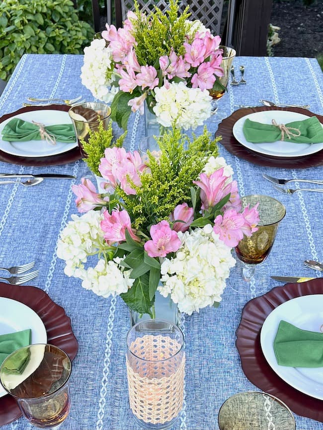 Outdoor Summer Tablescape with White Hydrangea and Pink Flowers