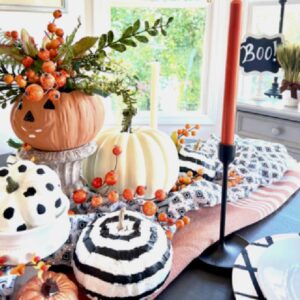 Cheerful Halloween table decorations with black and white pumpkins