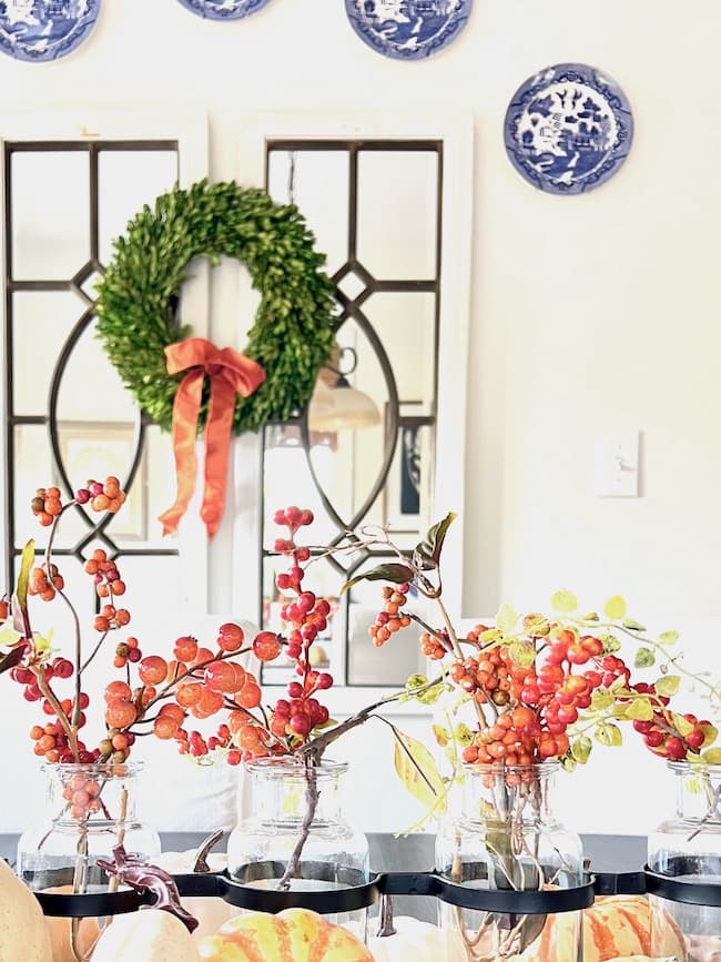 Fall Decorating on the kitchen table with Blue and White Plate Wall