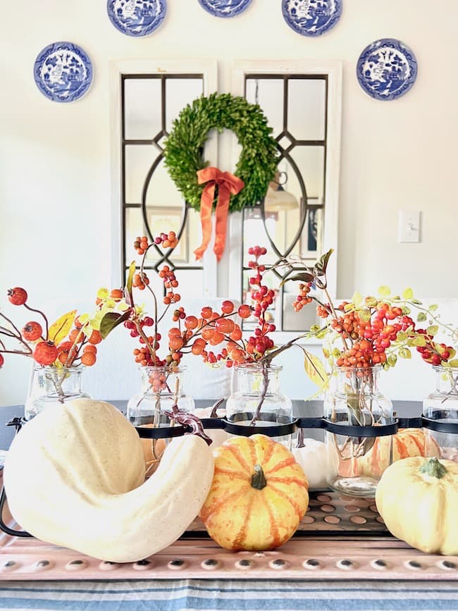 Fall Decorating on the kitchen table with Blue and White Plate Wall