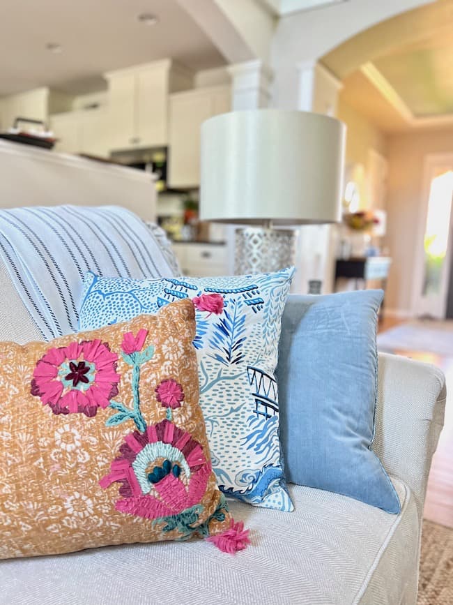 Living Room Sofa with fall colors and blue and white pillows