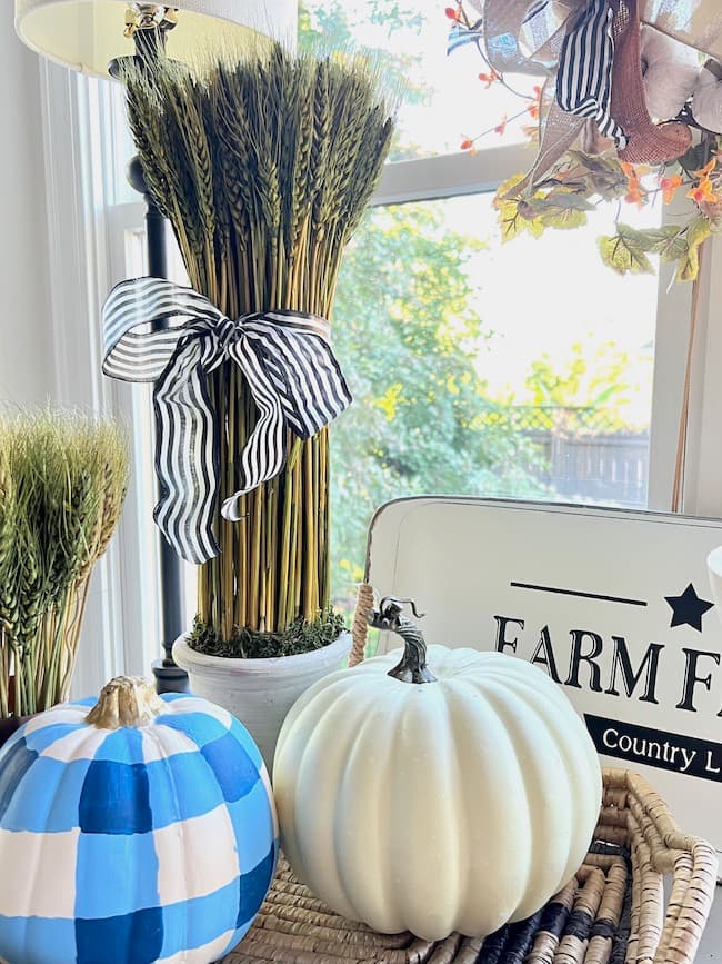 Blue and White Plaid Pumpkin and Wheat Bundles on Buffet