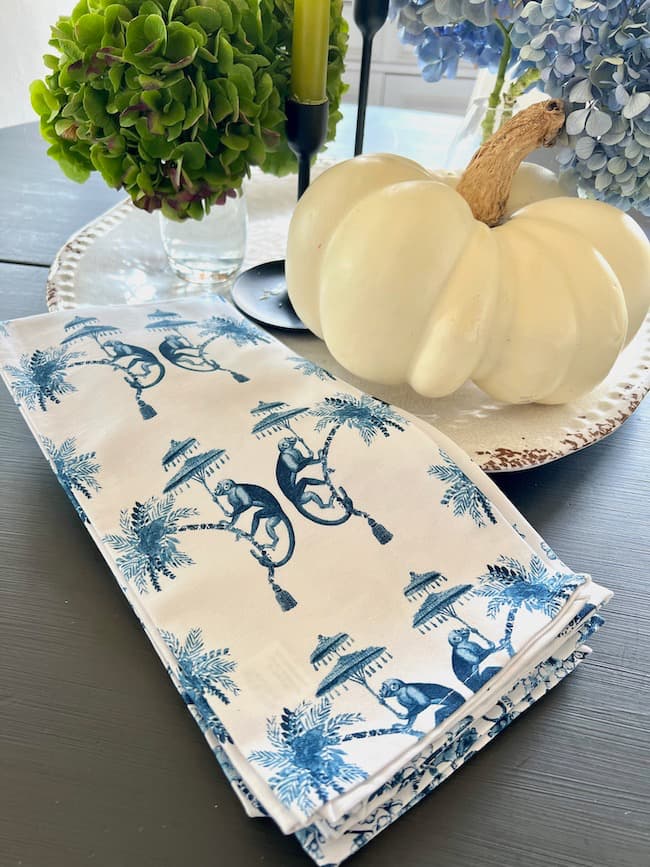 Add a pretty blue and white tea towel to your pumpkin centerpiece.