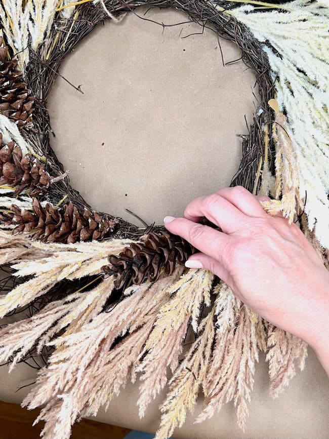 Add Pinecones to a pampas wreath