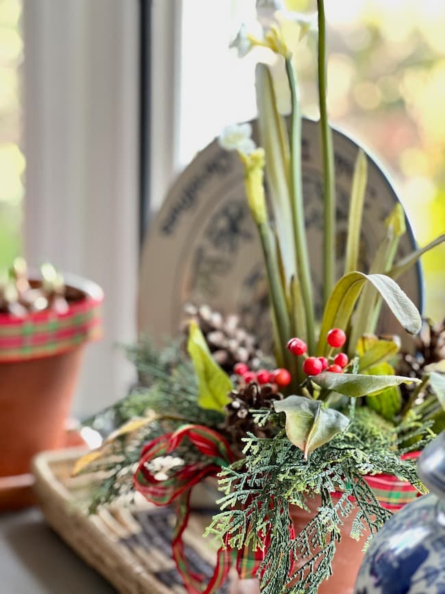 Faux paperwhites arrangement on kitchen buffet