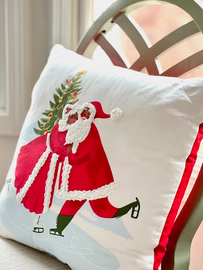 Kitchen Christmas Ideas -Add a Christmas pillow to  a kitchen chair