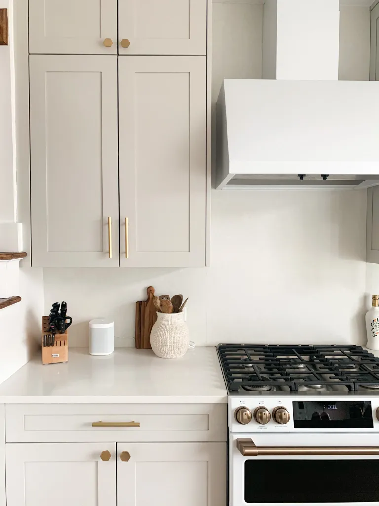 These kitchen cabinets are painted Sherwin Williams Agreeable Gray. Photo by Jenn Naye Herrmann