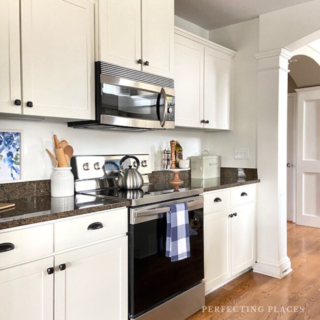 Kitchen cabinets painted with SW Alabaster.