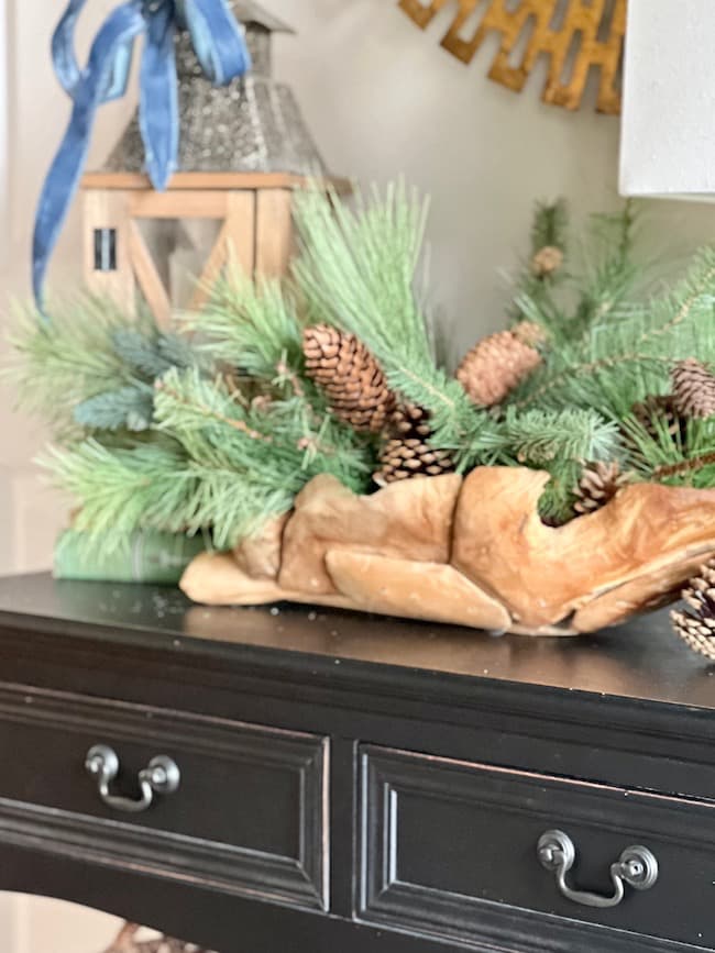 Wooden bowl and greenery for winter decorating ideas