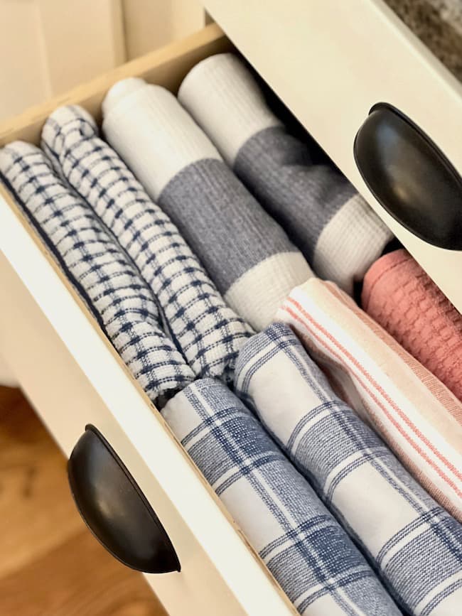 Organized your dish towel drawer in your kitchen.