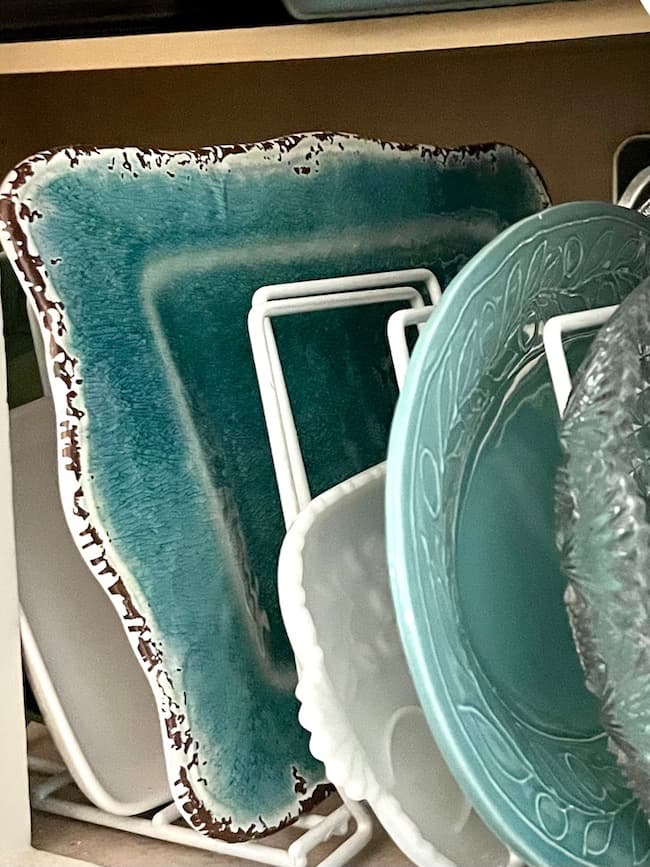 Store your casserole dishes and platters vertically in lower cabinets.