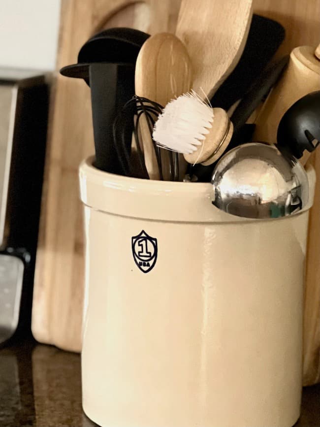 Declutter Your Kitchen Counters with a stone crock utensil organizer