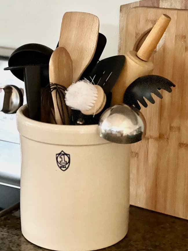 Declutter Your Kitchen Counters with a stone crock utensil organizer