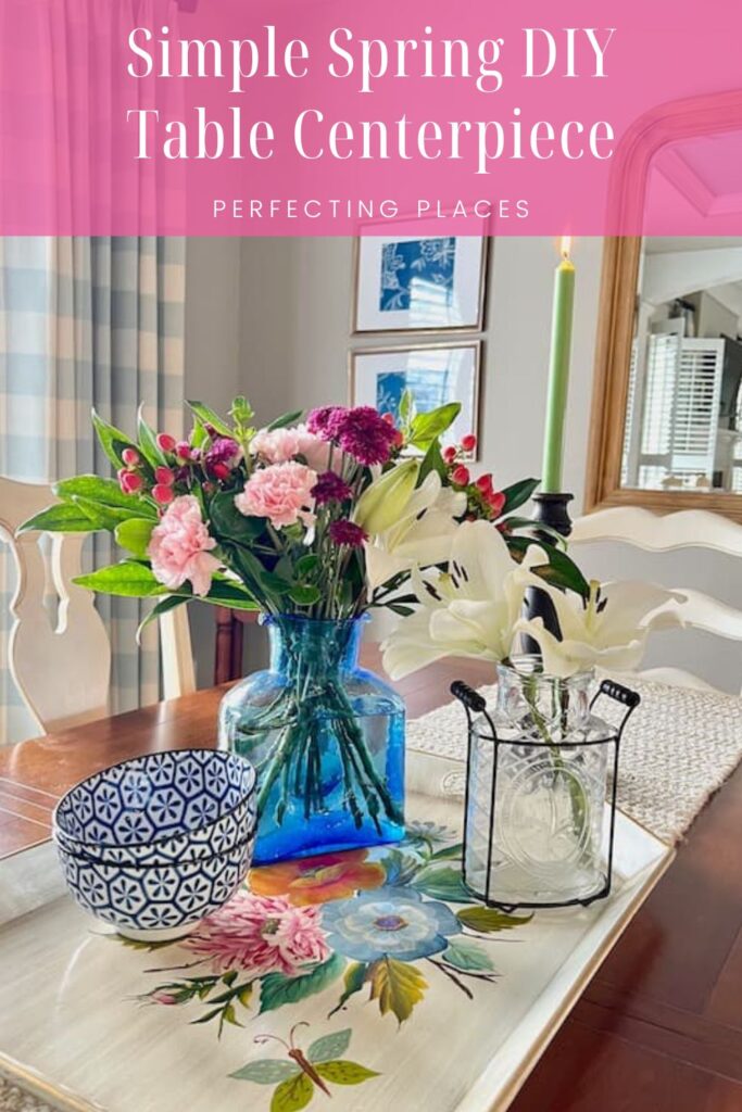 Pin this DIy table centerpiece with tole painted tray and flowers in blue glass vase