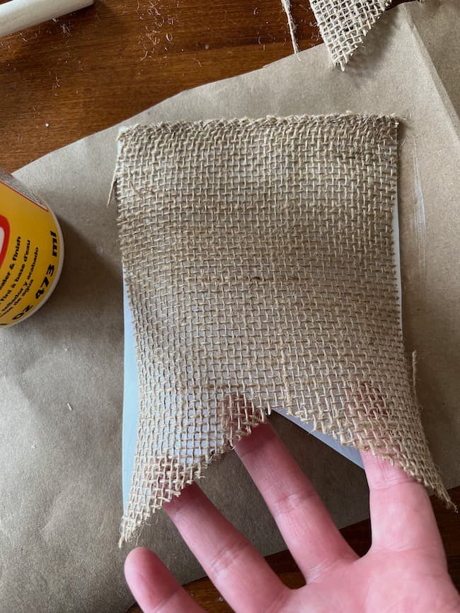 Cut the dovetail pennant shapes from burlap.