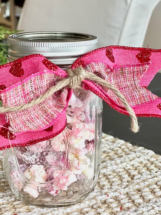 Give a Valentine's gift in a mason jar full of a sweet and salty snack mix recipe.