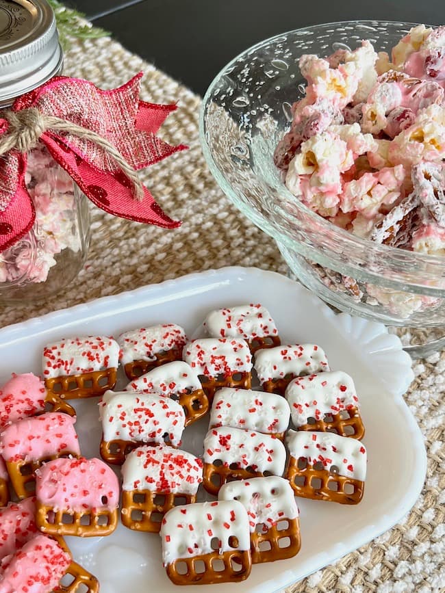 Candy covered pretzels with sweet and salty snack mix for Valentine's Day treats and gifts