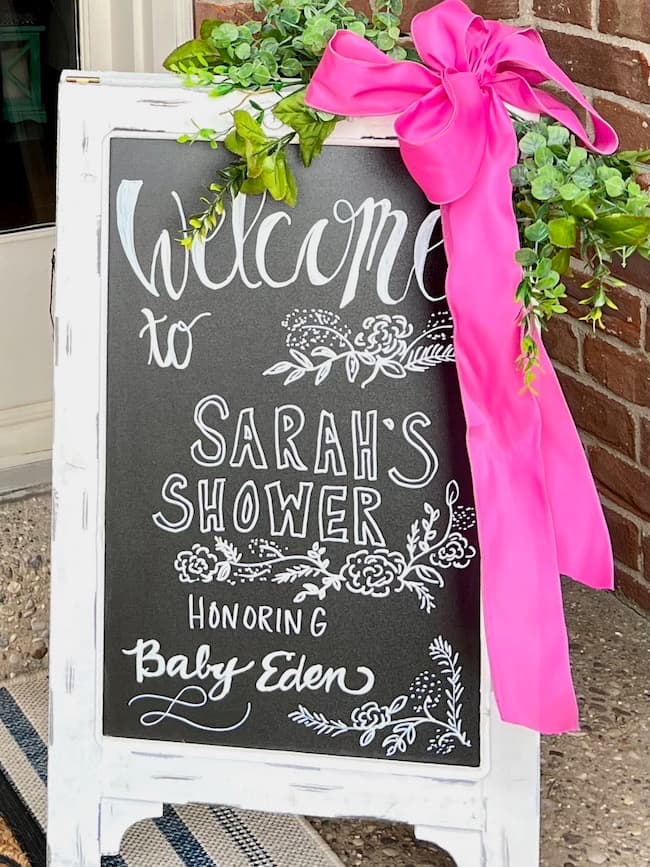 Baby shower garden theme chalkboard sign on front porch