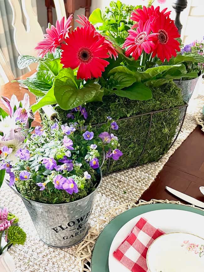 Ideas for Spring Flower Arrangements - pink Gerbera daisies in wire basket