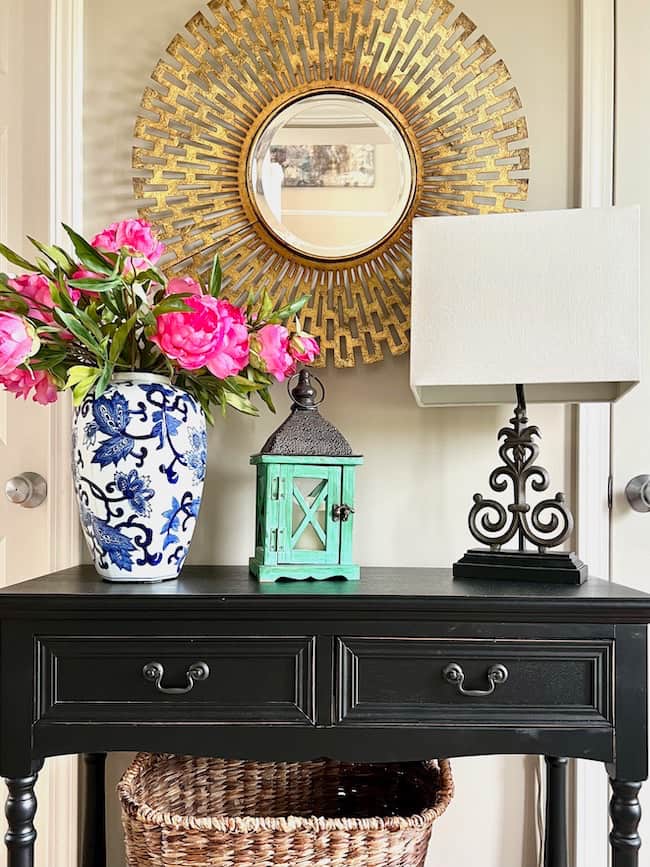 Ideas for Spring Flower Arrangements - Pink peonies styled in a blue and white ginger jar on foyer table 