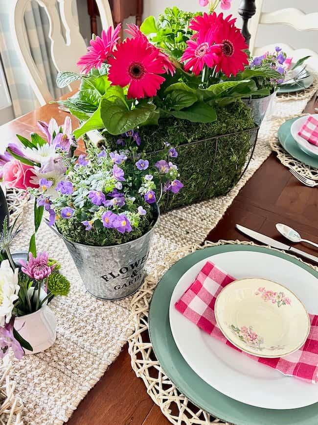 Mother's Day centerpiece and tablescape and place settings with pink and white plaid napkins