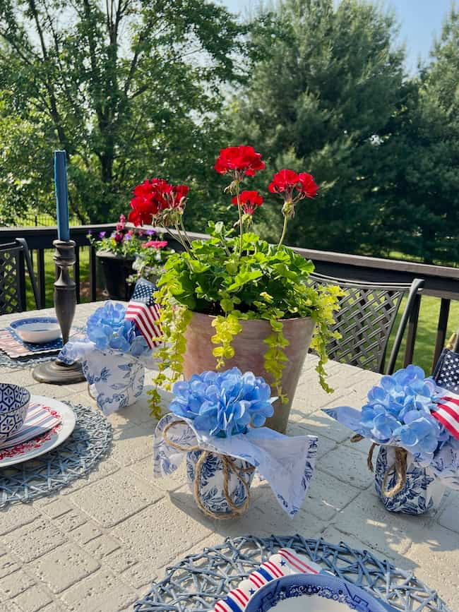 Patriotic centerpiece ideas with napkin-wrapped Mason jars