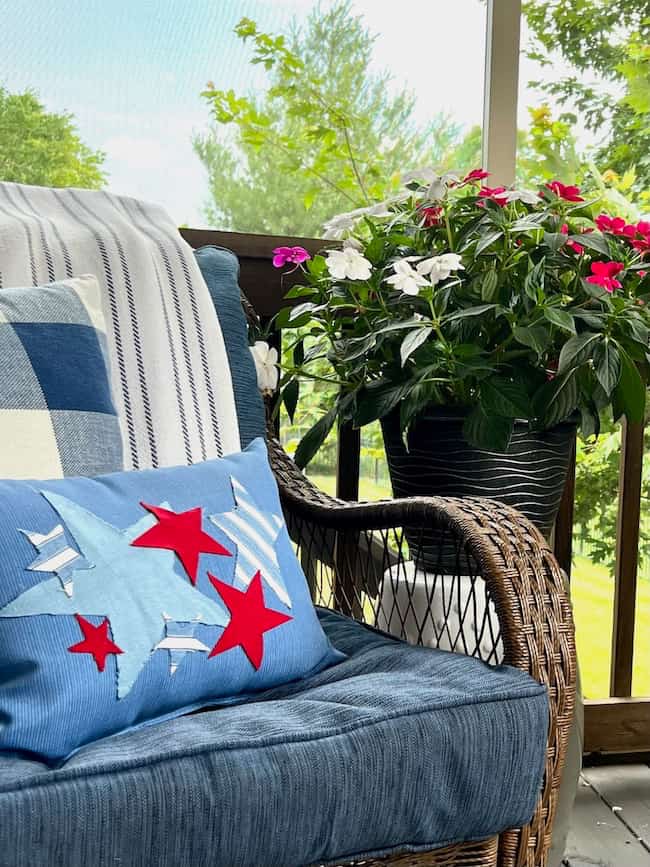 DIY Patriotic red, white, and blue star lumbar pillow on screen porch