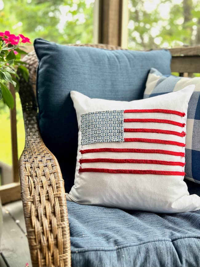 DIY patriotic flag pillow from fabric scraps and decorative trim