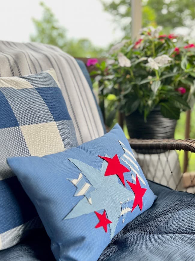 DIY Patriotic red, white, and blue star lumbar pillow on screen porch