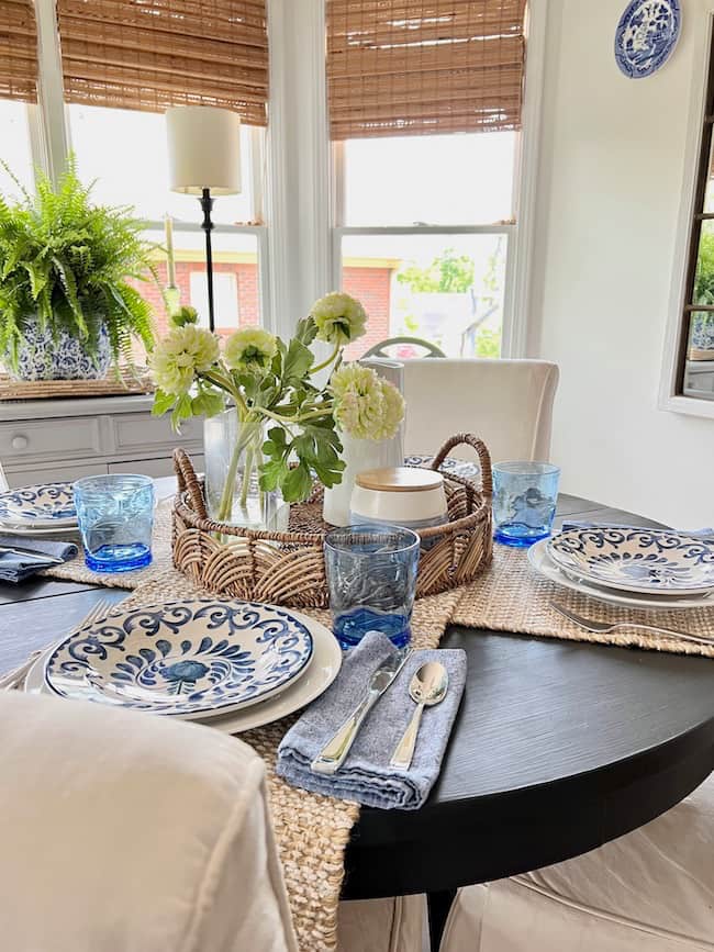 Blue and white summer table settings and rattan centerpiece