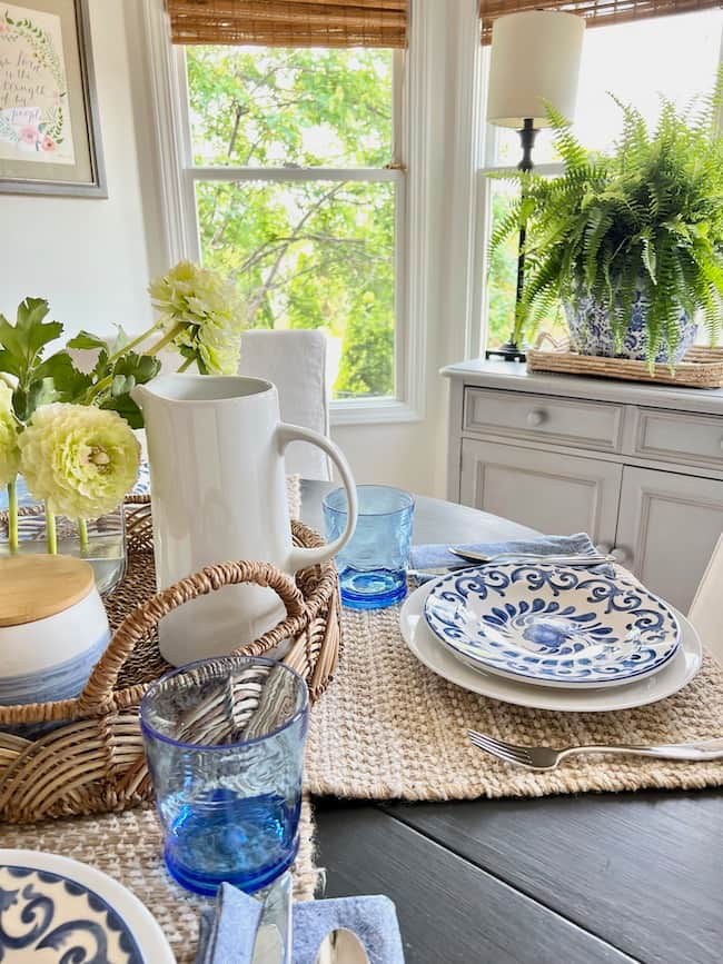 Summer Table Centerpiece with blue and white dishes and natural fiber linens