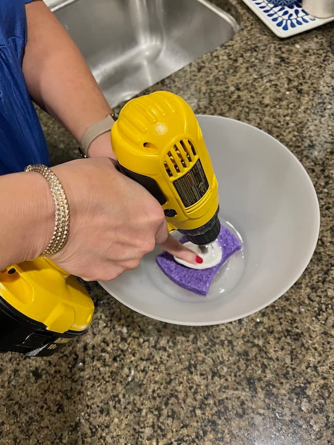 Drilling holes in oyster shells