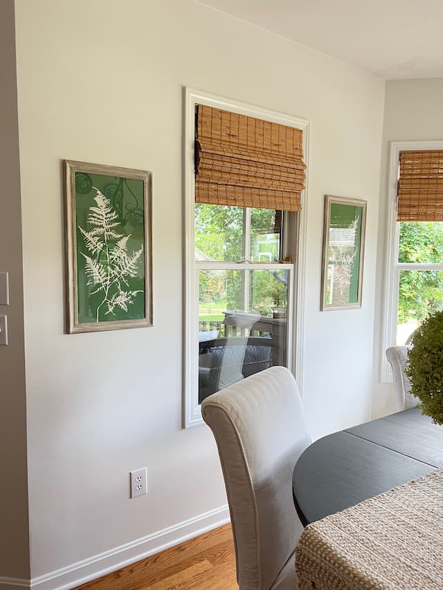 Dining table with dried hydrangeas and diy botanical prints in green and white fern silhouettes