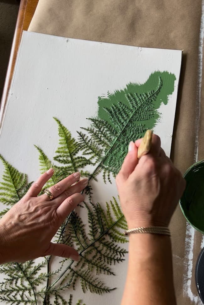 Painting the green botanical print.