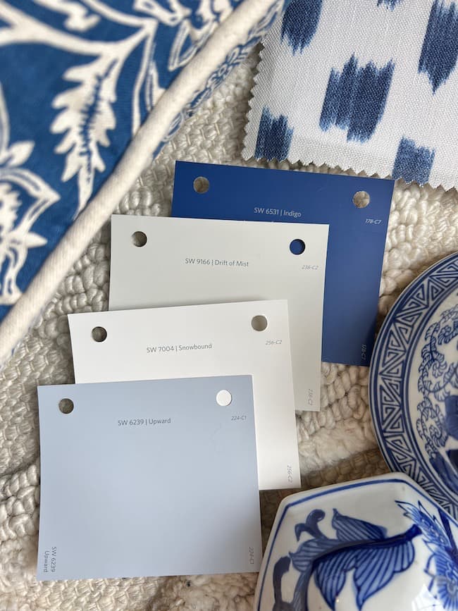 Color palette for Sherwin-Williams Upward, their 2024 Color of the Year with blues and neutrals.