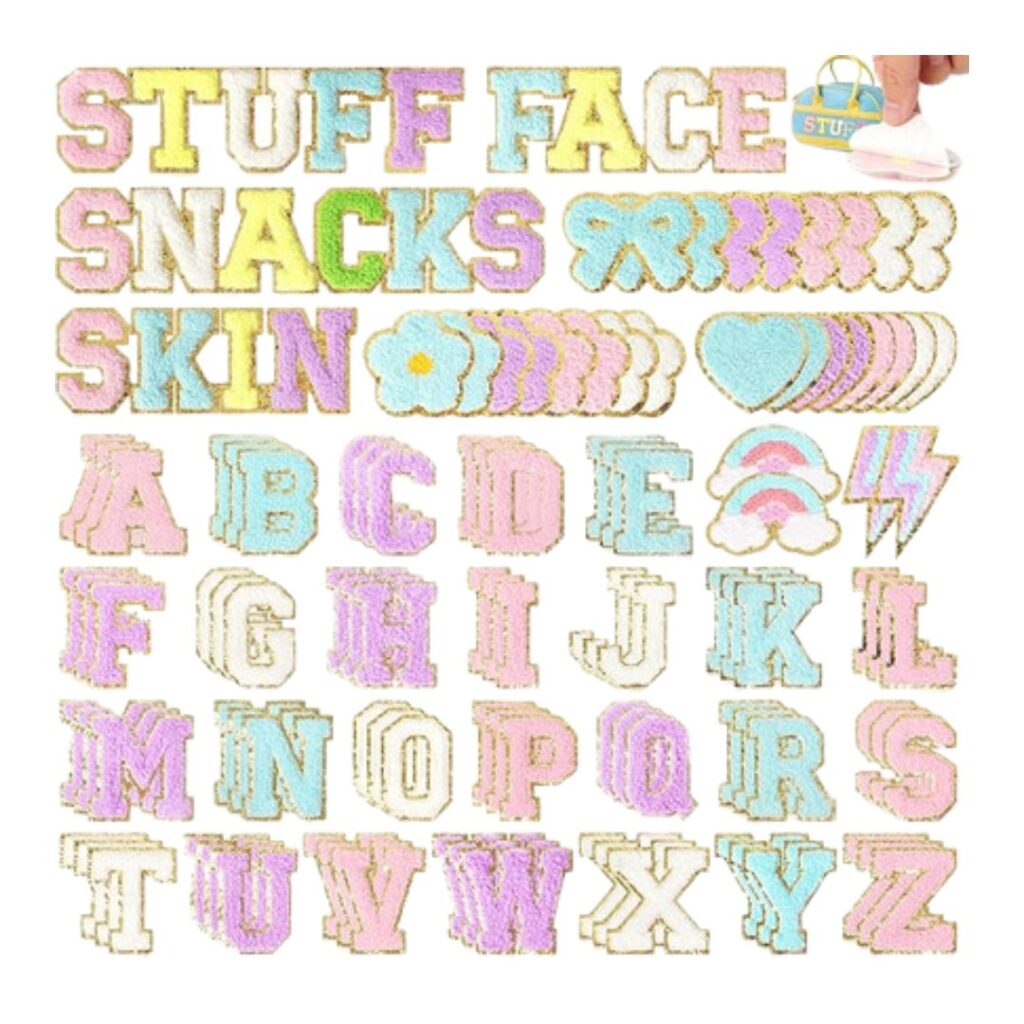 Colorful pastel and glittery alphabet patches arranged below words like "STUFF," "FACE," "SNACKS," and "SKIN"—plus flower, heart, and lightning bolt patches—make these perfect for fun teen girl birthday party ideas; a small hand holds a patch in the corner.