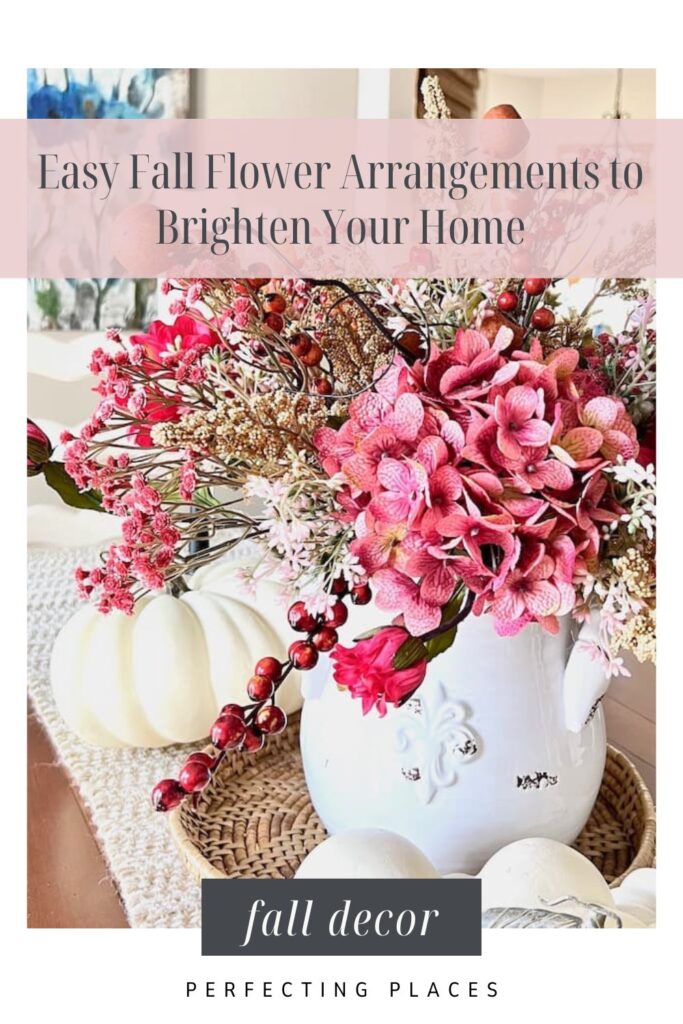 A simple fall flower arrangement in a white vase with pink and red flowers, accompanied by white pumpkins. Text overlay reads "Easy Fall Flower Arrangements to Brighten Your Home" and "fall decor - Perfecting Places.