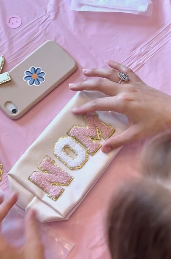 Decorate a cosmetic bag with adhesive chenille letters.