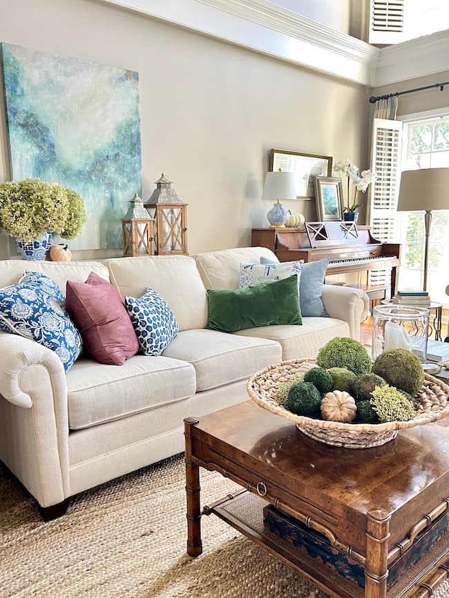 Fall Home Tour Living Room Decor -- Jewel tone Pillows on Sofa